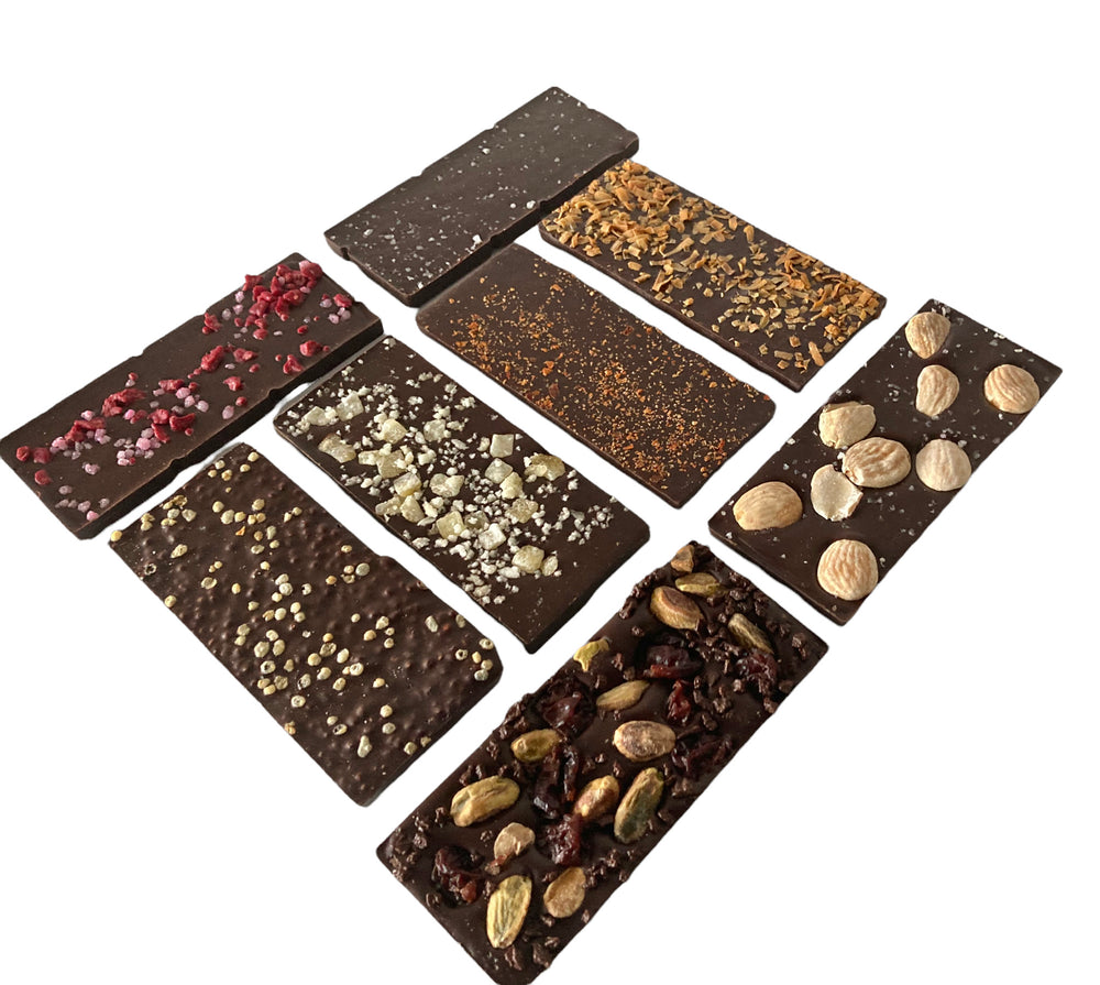 For our inclusion bars we are using a unique blend of 72% dark chocolate using fair trade cacao beans from parts of South America & the Caribbean. Bold cocoa flavor with a smooth finish.Flavors include,  Quinoa Toasted Coconut,  Roasted  Marcona Almond, Raspberry Rose, Lemon Ginger ,Peruvian Pink Salt ,Pistachio